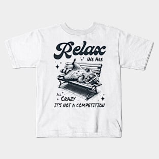 Relax we are all crazy its not a competition Kids T-Shirt